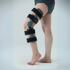 Person wearing a knee brace on left knee - Z1 Knee Brace